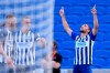 Brighton's Neal Maupay, right, celebrates after scoring his side's second goal during the English Premier League soccer match between Brighton & Hove Albion and Arsenal at the AMEX Stadium in Brighton, England, Saturday, June 20, 2020. (Mike Hewitt/Pool via AP)