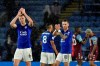Leicester's Jonny Evans, left, and James Maddison applaud the supporters at the end of the English Premier League soccer match between Leicester City and Aston Villa at the King Power Stadium, in Leicester, England, Monday, March 9, 2020. Leicester won 4-0.(AP Photo/Rui Vieira)