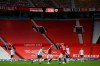 A display shows the score in the last minutes of the English Premier League soccer match between Manchester United and Tottenham Hotspur at Old Trafford in Manchester, England, Sunday, Oct. 4, 2020. (Alex Livesey/Pool via AP)