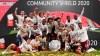 Arsenal players celebrate with the trophyt at the end of the English FA Community Shield soccer match between Arsenal and Liverpool at Wembley stadium in London, Saturday, Aug. 29, 2020. Arsenal defeated Liverpool 5-4 in a penalty shootout after the game ended tied 1-1. (Justin Tallis/Pool via AP)
