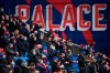 Crystal Palace fans watch their team warm up ahead of the English Premier League soccer match between Crystal Palace and Tottenham Hotspur at Selhurst Park in London, Sunday, Dec., 13, 2020. (Glyn Kirk/ Pool via AP))