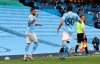 Manchester City's Riyad Mahrez, left celebrates with teammate Manchester City's Eric Garcia after scoring the opening goal of the game during the English Premier League soccer match between Manchester City and Leicester City at the Etihad stadium in Manchester, England, Sunday, Sept. 27, 2020. (Catherine Ivill/Pool via AP)