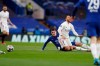Real Madrid's Eden Hazard, right, is tackled by Chelsea's Andreas Chistensen during the Champions League semifinal 2nd leg soccer match between Chelsea and Real Madrid at Stamford Bridge in London, Wednesday, May 5, 2021. (AP Photo/Alastair Grant)