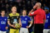 Southampton's James Ward-Prowse, reacts as the referee Lee mason listens to the VAR referee who said that Southampton's Shane Long was offside when fouled by Leicester's Caglar Soyuncu, so no penalty is given during the English Premier League soccer match between Leicester City and Southampton at the King Power stadium in Leicester, England Saturday, Jan. 11, 2020. (AP Photo/Rui Vieira)