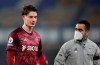 Leeds United's Robin Koch leaves the pitch at half time with an injury during the English Premier League soccer match between Everton and Leeds United, at Goodison Park in Liverpool, England, Saturday Nov. 28, 2020. (Clive Brunskill/Pool Via AP)