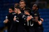 West Ham's Michail Antonio, right celebrates with teammates after scoring his sides 1st goal during the English Premier League soccer match between Burnley and West Ham United and at Turf Moor stadium in Burnley, England, Monday, May 3, 2021. (AP Photo/Gareth Copley/Pool via AP)