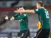 Tottenham's Eric Dier, right and Tottenham's Pierre-Emile Hojbjerg gesture to each other during the English Premier League soccer match between Wolverhampton Wanderers and Tottenham Hotspur at Molineux Stadium, in Woverhampton, England, Sunday, Dec. 27, 2020. (Carl Recine/ Pool via AP)