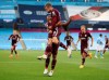 Leicester's Jamie Vardy celebrates scoring his sides third goal of the game from the penalty spot during the English Premier League soccer match between Manchester City and Leicester City at the Etihad stadium in Manchester, England, Sunday, Sept. 27, 2020. (Catherine Ivill/Pool via AP)