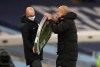 Manchester City's head coach Pep Guardiola, right, reacts to the 4th official during their English Premier League soccer match between Manchester City and West Bromwich Albion at the Etihad Stadium in Manchester, England, Tuesday, Dec., 15, 2020. (Michael Regan/ Pool via AP)