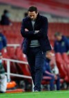 Chelsea's head coach Frank Lampard looks down as he walks on the side lines during their English Premier League soccer match between Arsenal and Chelsea at the Emirates stadium in London, Saturday, Dec. 26, 2020. (Julian Finney Pool via AP)