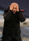 Manchester City's head coach Pep Guardiola reacts during their English Premier League soccer match between Manchester City and West Bromwich Albion at the Etihad Stadium in Manchester, England, Tuesday, Dec., 15, 2020. (Martin Rickett/ Pool via AP)