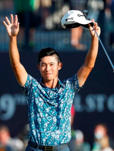 United States' Collin Morikawa celebrates on the 18th green after winning the British Open Golf Championship at Royal St George's golf course Sandwich, England, Sunday, July 18, 2021. (AP Photo/Peter Morrison)