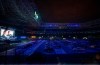 People watch a movie from inside their cars at a drive-in installed in the Palmeiras soccer stadium amid the coronavirus outbreak in Sao Paulo, Brazil, Thursday, June 25, 2020. (AP Photo/Andre Penner)