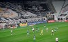 Players of Corinthians, in white, and Palmeiras play the Sao Paulo league first leg final soccer match at the Arena Corinthians stadium in Sao Paulo, Brazil, Wednesday, Aug. 5, 2020. The match is being played without spectators to curb the spread of COVID-19. (AP Photo/Andre Penner)
