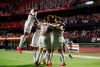 Players of Brazil's Sao Paulo celebrate their side's 3rd goal scored by teammate Igor Gomes during a Copa Libertadores soccer match against Ecuador's Liga Deportiva Universitaria in Sao Paulo, Brazil, Wednesday, March 11, 2020. (AP Photo/Andre Penner)