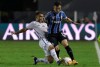 Pepe of Brazil's Gremio, right, and Renyer of Brazil's Santos battle for the ball during a Copa Libertadores quarterfinal second leg soccer match in Santos, Brazil, Wednesday, Dec. 16, 2020. (Amanda Perobelli/Pool via AP)