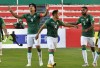 Bolivia's Marcelo Martins, left, celebrates with teammates after scoring his side's 2nd goal during a qualifying soccer match for the FIFA World Cup Qatar 2022 against Ecuador In La Paz, Bolivia, Thursday, Nov. 12, 2020. (Aizar Raldes/Pool via AP)