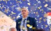 Coach Hernan Crespo of Argentina's Defensa y Justicia stand at the podium after winning the Copa Sudamericana final soccer match against Argentina's Lanus in Cordoba, Argentina, Saturday, Jan. 23, 2021. Defensa y Justicia won 3-0. (Nicolas Aguilera/Pool via AP)