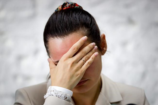 Sviatlana Tsikhanouskaya, candidate for the presidential elections, reacts during a news conference after the Belarusian presidential election in Minsk, Belarus, Monday, Aug. 10, 2020. The country's central election commission said that with all ballots counted, Lukashenko, who has led Belarus for 26 years, took 80.23% of the vote and his main opposition challenger, Sviatlana Tsikhanouskaya, had only 9.9%.