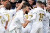Real Madrid's Karim Benzema, cnter, celebrates after scoring his side's first goal during a Spanish La Liga soccer match between Real Madrid and Atletico Madrid at the Santiago Bernabeu stadium in Madrid, Saturday, Feb. 1, 2020. (AP Photo/Bernat Armangue)