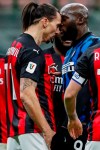 AC Milan's Zlatan Ibrahimovic, left, and Inter Milan's Romelu Lukaku argue during an Italian Cup round of 8 soccer match between Inter Milan and AC Milan at the San Siro stadium, in Milan, Italy, Tuesday, Jan. 26, 2021. (AP Photo/Antonio Calanni)