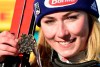 United States' Mikaela Shiffrin shows her bronze medal in the women's super-G, at the alpine ski World Championships, in Cortina d'Ampezzo, Italy, Thursday, Feb. 11, 2021. (AP Photo/Marco Tacca)