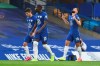 Chelsea's Olivier Giroud, right, celebrates after scoring his side's opening goal during the English Premier League soccer match between Chelsea and Watford at the Stamford Bridge stadium in London, Saturday, July 4, 2020. (Glynn Kirk/Pool via AP)