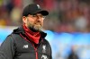 Liverpool's manager Jurgen Klopp smiles prior to the group E Champions League soccer match between Salzburg and Liverpool, in Salzburg, Austria, Tuesday, Dec. 10, 2019. (AP Photo/Kerstin Joensson)