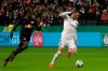 Frankfurt's Filip Kostic, right, is challenged by Leipzig's Dayot Upamecano during the German DFB Cup third round match between Eintracht Frankfurt and RB Leipzig at the Commerzbank-Arena stadium in Frankfurt, Germany, Tuesday, Feb. 4, 2020. (AP Photo/Michael Probst)