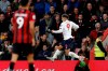Liverpool's Roberto Firmino celbrates after Liverpool's Alex Oxlade-Chamberlain, not seen, scored his side's opening goal during the English Premier League soccer match between Bournemouth and Liverpool at the Vitality stadium in Bournemouth, England, Saturday, Dec. 7, 2019. (AP Photo/Alastair Grant)