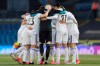 Leeds United players gather ahead of the English Premier League soccer match between Leeds United and Liverpool at the Elland Road stadium in Leeds, England, Monday, April 19, 2021. (Clive Brunskill/Pool via AP)
