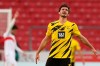 Dortmund's Mats Hummels reacts during the German Bundesliga soccer match between Stuttgart and Dortmund at the Mercedes-Benz Arena stadium in Stuttgart, Germany, Saturday, April 10, 2021. (Tom Weller/Pool via AP)
