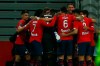 Lille players celebrate after Jonathan David scored his side's opening goal during the French League One soccer match between Lille and Marseille at the Stade Pierre Mauroy stadium in Villeneuve-d'Ascq, France, Wednesday, March 3, 2021. (AP Photo/Michel Spingler)