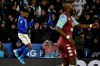 Leicester's Kelechi Iheanacho, left, celebrates after scoring his side's opening goal during the English League Cup semifinal first leg soccer match between Leicester City and Aston Villa at the King Power Stadium in Leicester, England, Wednesday, Jan. 8, 2020. (AP Photo/Rui Vieira)