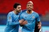 Manchester City's Gabriel Jesus, right, celebrates with Manchester City's Bernardo Silva after scoring his side's second goal during the Champions League round of 16 first leg soccer match between Borussia Monchengladbach and Manchester City at the Puskas Arena stadium in Budapest, Hungary, Wednesday, Feb. 24, 2021. (AP Photo/Laszlo Balogh)