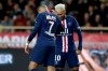 PSG's Neymar, right, celebrates with PSG's Kylian Mbappe after scoring his side's second goal during the French League One soccer match between Monaco and Paris Saint-Germain at the Louis II stadium in Monaco, Wednesday, Jan. 15, 2019. (AP Photo/Daniel Cole)