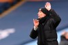 Manchester City's head coach Pep Guardiola reacts during the English Premier League match between Manchester City and Sheffield United at the the City of Manchester Stadium in Manchester, England, Saturday, Jan. 30, 2021. (Laurence Griffiths/Pool via AP)