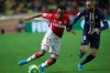Monaco's Gelson Martins, left, is challenged by PSG's Layvin Kurzawa during the French League One soccer match between Monaco and Paris Saint-Germain at the Louis II stadium in Monaco, Wednesday, Jan. 15, 2019. (AP Photo/Daniel Cole)