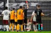 Arsenal's David Luiz, center, is shown a red card during the English Premier League match between Wolverhampton Wanderers and Arsenal at the Molineux Stadium in Wolverhampton, England, Tuesday, Feb. 2, 2021. (Cath Ivill/Pool via AP)