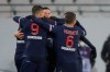 PSG players celebrate after Neymar scored his side's second goal during the Champions Trophy soccer match between Paris Saint-Germain and Olympique Marseille at the Bollaert stadium in Lens, northern France, Wednesday, Jan.13, 2021. (AP Photo/Christophe Ena)