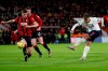 Liverpool's Roberto Firmino shoots but fails to score during the English Premier League soccer match between Bournemouth and Liverpool at the Vitality stadium in Bournemouth, England, Saturday, Dec. 7, 2019. (AP Photo/Alastair Grant)