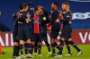 PSG players celebrate their third goal during the French League One soccer match between Paris Saint-Germain and Montpellier at the Parc des Princes stadium in Paris, France, Friday, Jan.22, 2021. (AP Photo/Thibault Camus)