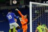Burnley's goalkeeper Nick Pope makes a save in front of Brighton's Danny Welbeck during the English Premier League soccer match between Brighton and Burnley at the Falmer stadium in Brighton, England, Friday, Nov. 6, 2020. (Richard Heathcote/Pool via AP)