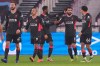Liverpool's Mohamed Salah, second right, celebrates after scoring his side's opening goal during the English Premier League match between West Ham and Liverpool at the the London Stadium in London, Sunday, Jan. 31, 2021. (John Walton/Pool via AP)