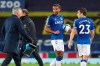 Everton's Dominic Calvert-Lewin holds the ball at the end of the English League Cup round of 16 soccer match between Everton and West Ham at the Goodison Park stadium in Liverpool, England, Wednesday, Sept. 30, 2020. (Alex Livesey, Pool via AP)
