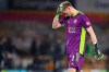 Sheffield United's goalkeeper Aaron Ramsdale reacts after the English Premier League soccer match between Wolves and Sheffield United at the Molineux Stadium in Wolverhampton, England, Saturday, April 17, 2021. (Catherine Ivill/Pool via AP)