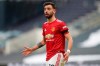 Manchester United's Bruno Fernandes reacts during the English Premier League soccer match between Tottenham Hotspur and Manchester United at the Tottenham Hotspur Stadium in London, Sunday, April 11, 2021. (Matthew Childs/Pool via AP)