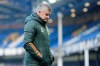 Manchester United's manager Ole Gunnar Solskjaer walks to the bench during the English Premier League soccer match between Everton and Manchester United at the Goodison Park stadium in Liverpool, England, Saturday, Nov. 7, 2020. (Clive Brunskill/Pool via AP)