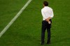 Inter Milan's head coach Antonio Conte stands on the field at the end of the Europa League final soccer match between Sevilla and Inter Milan in Cologne, Germany, Friday, Aug. 21, 2020. Sevilla won 3:2. (Friedemann Vogel/Pool via AP)