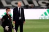 Real Madrid's head coach Zinedine Zidane looks at the field during the Spanish La Liga soccer match between Real Madrid and Getafe at the Alfredo di Stefano stadium in Madrid, Spain, Thursday, July 2, 2020. (AP Photo/Bernat Armangue)